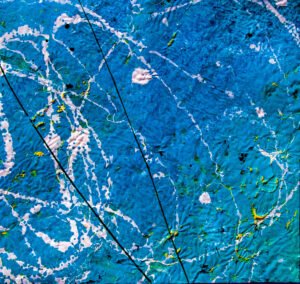 blue space abstraction with white bended lines and black threads, yellow and white dots on rough texture bright blue mottled background